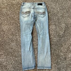 Buckle black light wash jeans